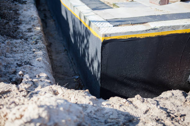 Professional Waterproofing technician working in Loretto, PA